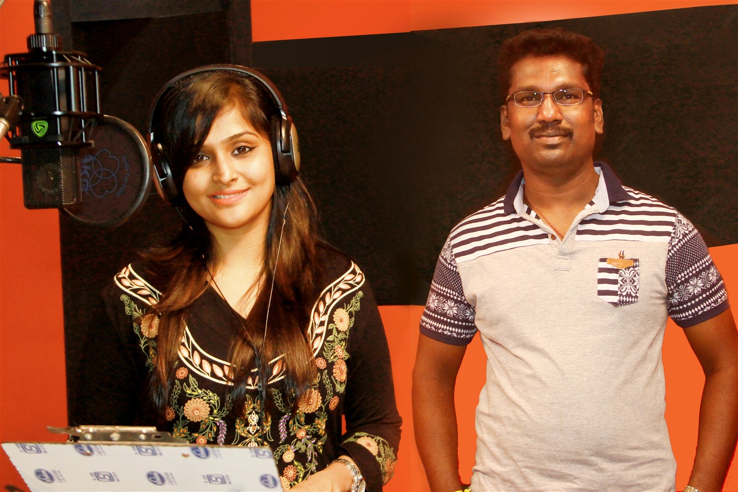 Director Aadhi Rajan and Remya Nambeesan