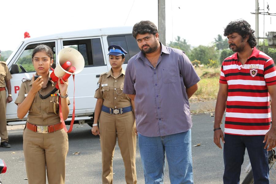 Ivan Yarendru Therikiratha Movie Stills | Varsha Bollamma, Arjunan, NKPK Rajkumar