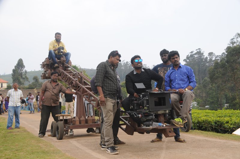 Director Deekay on the sets of Kavalai Vendam
