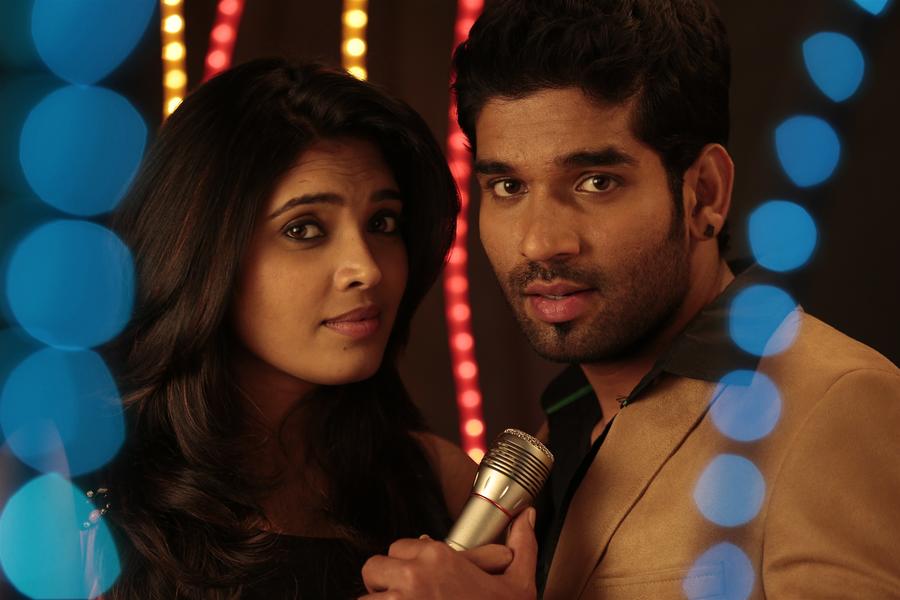 Ishara Nair and Suresh Ravi stills from Adhi Maedhavigal Movie