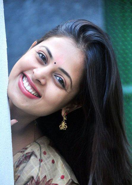 Actress Sindhu Menon photos.