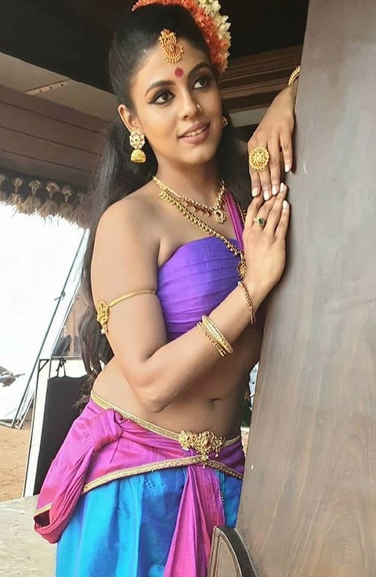 Actress Iniya Cute Stills.