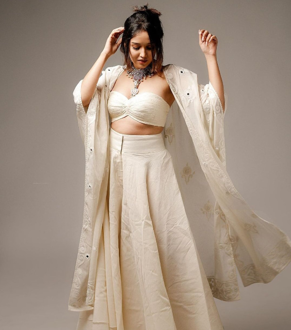 Explore the enchanting world of Anikha through these mesmerizing stills!  Don't miss out on the latest trending photos of the talented star!