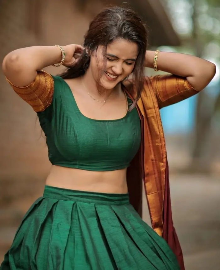  \"Explore a stunning collection of photographs featuring the enchanting Chaitra Reddy, exuding timeless elegance and beauty. From captivating poses to graceful moments, witness the allure of Chaitra Reddy in this mesmerizing stills compilation. Don't miss out on these trending snapshots that perfectly capture her charm and grace.  #ChaitraReddy #ElegantBeauty #StunningPhotoshoot #TimelessGrace\"