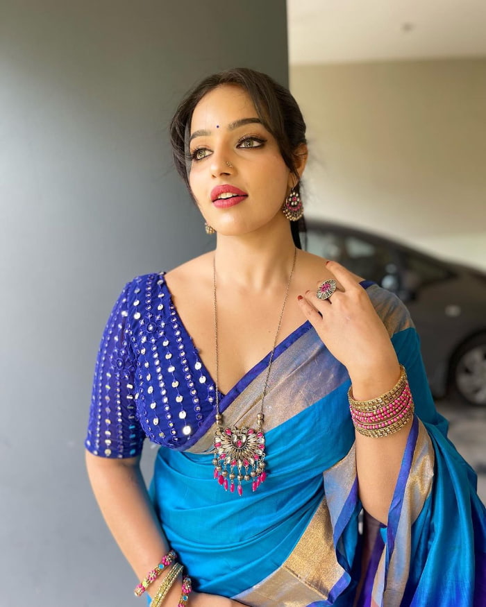 \"Explore the mesmerizing world of Malavika Menon through these stunning images. Get ready to be enchanted by her beauty and charm. Don't miss out on the latest trending sensation. #MalavikaMenon #SizzlingImages #BeautyUnleashed\"
