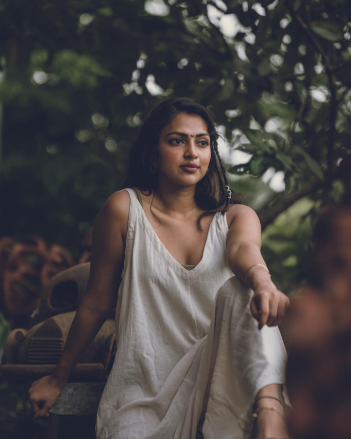 \"Experience the hottest trends in Amala Paul's scintillating photos!  Dive into the world of glamour and beauty with these captivating images. Discover the latest in fashion and style. #AmalaPaul #TrendingPhotos #Glamour #Fashion #Beauty\"
