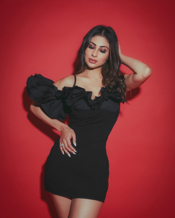 \"Explore the latest mesmerizing snapshots of the enchanting Mouni Roy! Dive into a world of timeless beauty and elegance with these stunning stills. #MouniRoy #BollywoodBeauty #TrendingPortraits\"