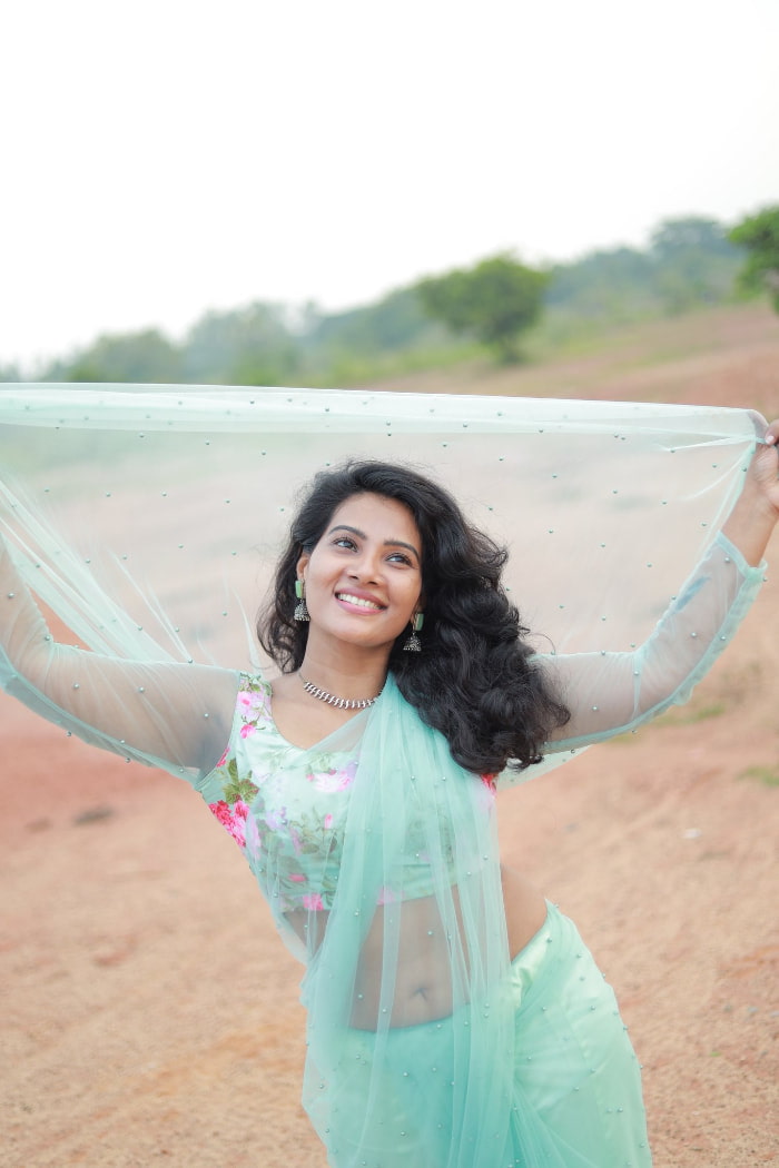 \"Explore the enchanting world of Dhivya Duraisamy through these stunning photographs. Witness her timeless beauty and charm in the latest trending shots. #DhivyaDuraisamy #CharmingStills #PhotographyMagic #TrendingBeauty\"