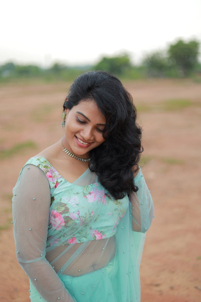 \"Explore the enchanting world of Dhivya Duraisamy through these stunning photographs. Witness her timeless beauty and charm in the latest trending shots. #DhivyaDuraisamy #CharmingStills #PhotographyMagic #TrendingBeauty\"