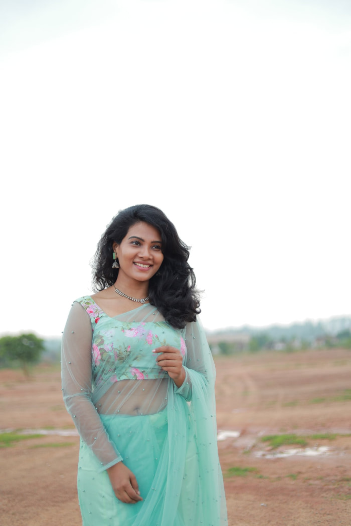 \"Explore the enchanting world of Dhivya Duraisamy through these stunning photographs. Witness her timeless beauty and charm in the latest trending shots. #DhivyaDuraisamy #CharmingStills #PhotographyMagic #TrendingBeauty\"