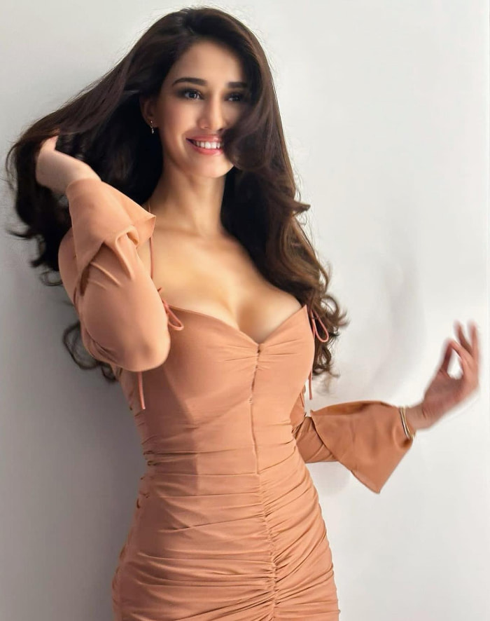 \"Experience the sheer elegance and charm of Disha Patani through these captivating stills from her latest photoshoot. Witness the allure and grace of this Bollywood sensation as she graces the camera with her beauty. Don't miss out on the latest trending #DishaPatani #BollywoodBeauty #CelebPhotoshoot #StunningElegance\"