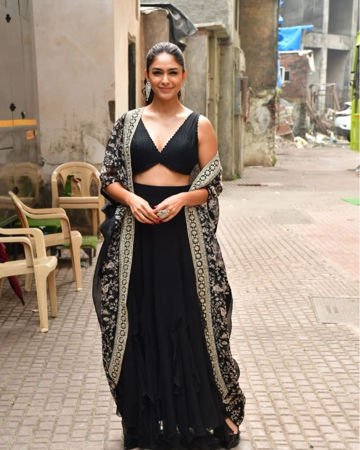 \"Explore the latest captivating images of the enchanting Mrunal Thakur, a rising star in the entertainment world. Discover her charisma through stunning visuals, and get ready to be mesmerized. #MrunalThakur #CelebPics #TrendingPhotos #EntertainmentWorld\"
