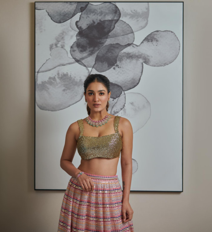 \"Explore the enchanting world of Saniya Iyappan through these mesmerizing stills. Witness the latest trending beauty and elegance with this collection. #SaniyaIyappan #TrendingStills #ElegantPortraits\"