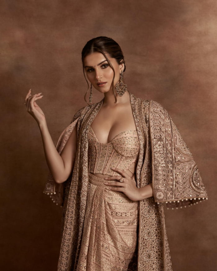 \"Discover the enchanting beauty of Bollywood sensation Tara Sutaria in these stunning photographs. Dive into the latest trend in glamour with Tara's charming stills. Don't miss out on this mesmerizing visual journey!  #TaraSutaria #BollywoodGlamour #CharmingStills #TrendingPhotographs\"