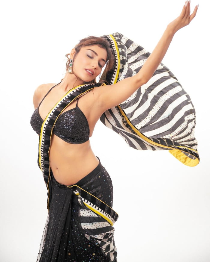 \"Explore mesmerizing and breathtaking stills showcasing the stunning Ishita Raj. Discover the allure and charm of Ishita Raj through these exquisite images. #IshitaRaj #StunningShots #VisualBeauty\"