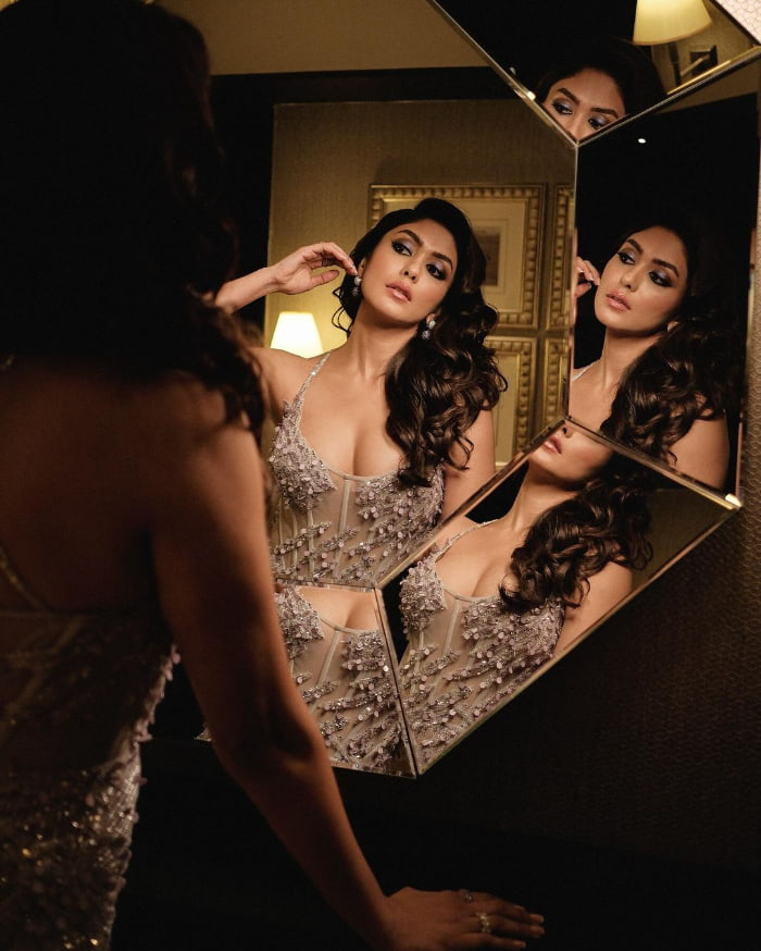 \"Explore a mesmerizing collection of beautiful images showcasing the talented Bollywood actress, Mrunal Thakur. From glamorous shots to candid moments, these lovely pictures capture the essence of her charm and charisma. Don't miss out on this visual delight! #MrunalThakur #BollywoodBeauty #CelebrityPhotos #GlamorousShots #CandidMoments #StarStruck\"