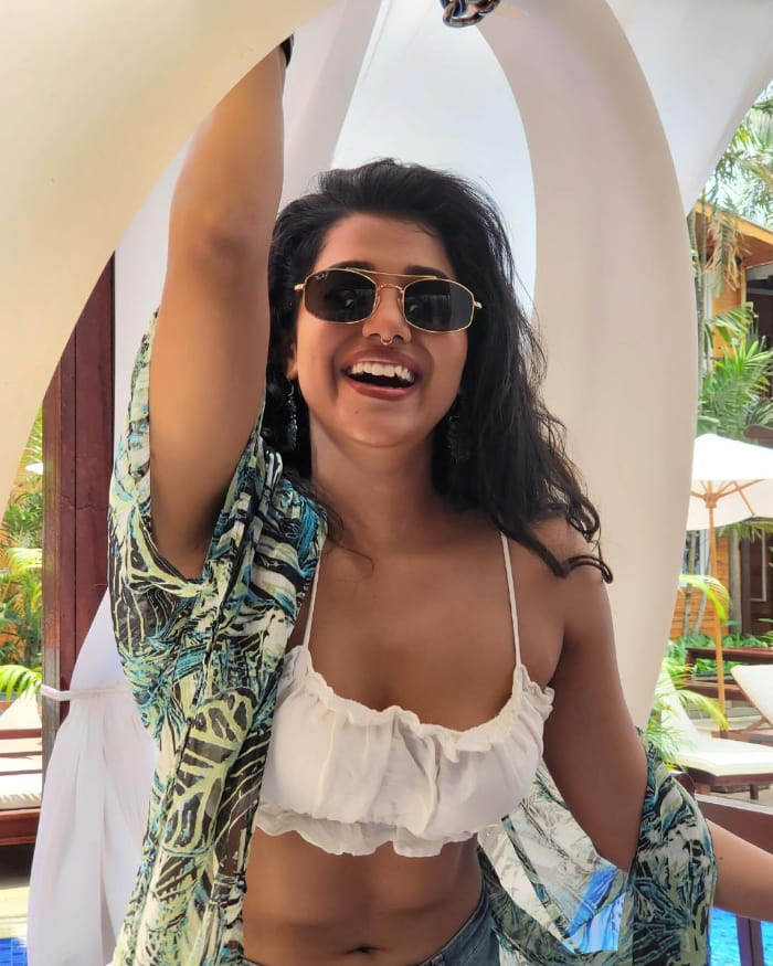 Explore mesmerizing stills of Shilpa Manjunath, showcasing her beauty and charm. Get lost in her captivating gaze and elegant poses. #ShilpaManjunath #PhotoCollection #StunningStills