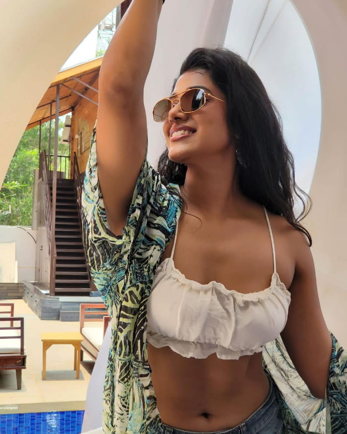 Explore mesmerizing stills of Shilpa Manjunath, showcasing her beauty and charm. Get lost in her captivating gaze and elegant poses. #ShilpaManjunath #PhotoCollection #StunningStills