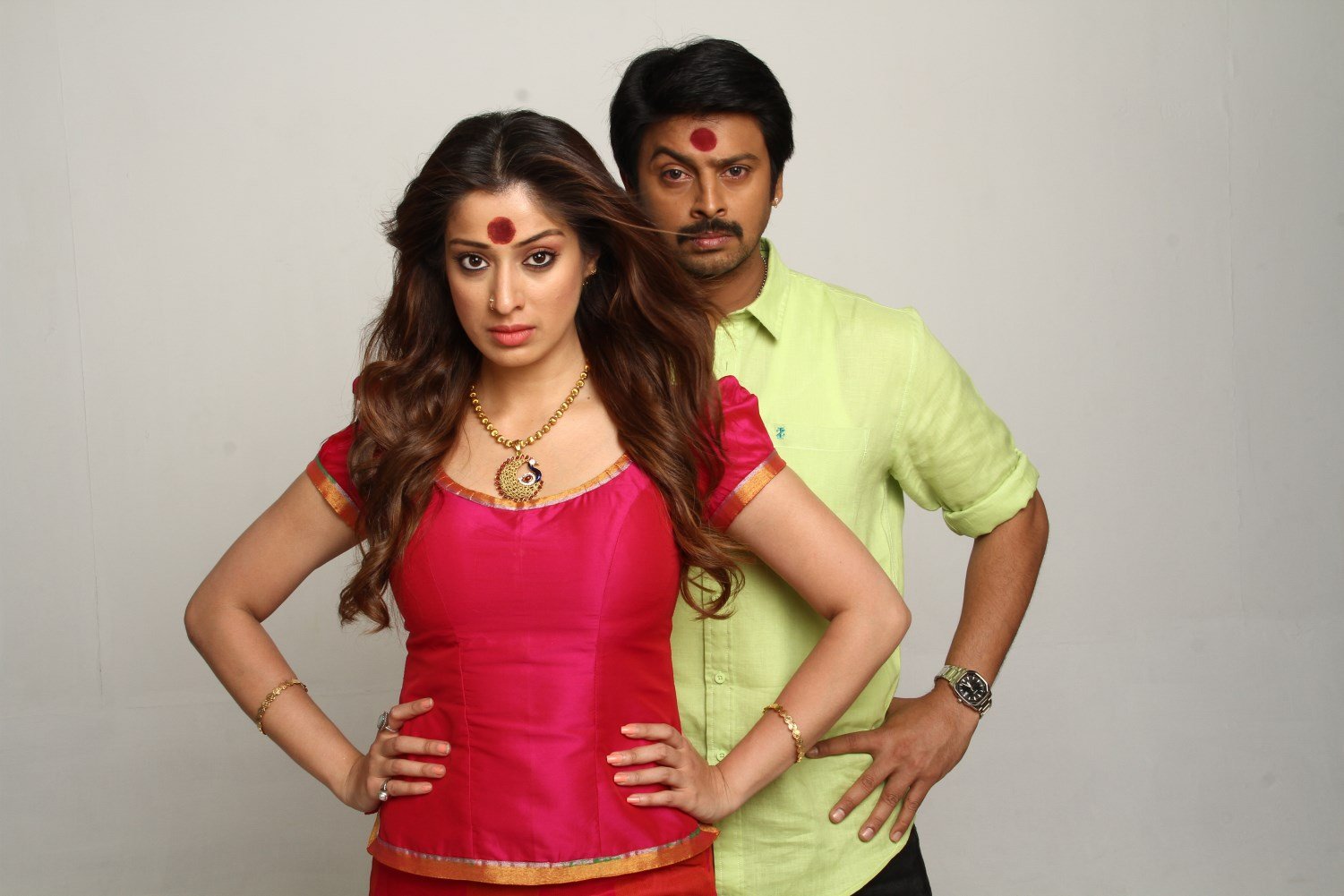 Lakshmi Rai and Srikanth in the movie Sowkarpettai